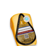 Image of The Cheese Guy Fromage De Paulette, a light-colored wedge-shaped block of cheese, showing the brand logo, 'Fromage De Paulette' product name, and 'Port Salut & Raclette style'.