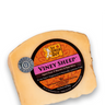 A wedge of The Cheese Guy Viney Sheep cheese, aged over 9 months in red wine, featuring a circular orange and black label with the product name in bold pink letters, indicating it's made from grass-fed sheep, vegetarian, and naturally lactose-free.