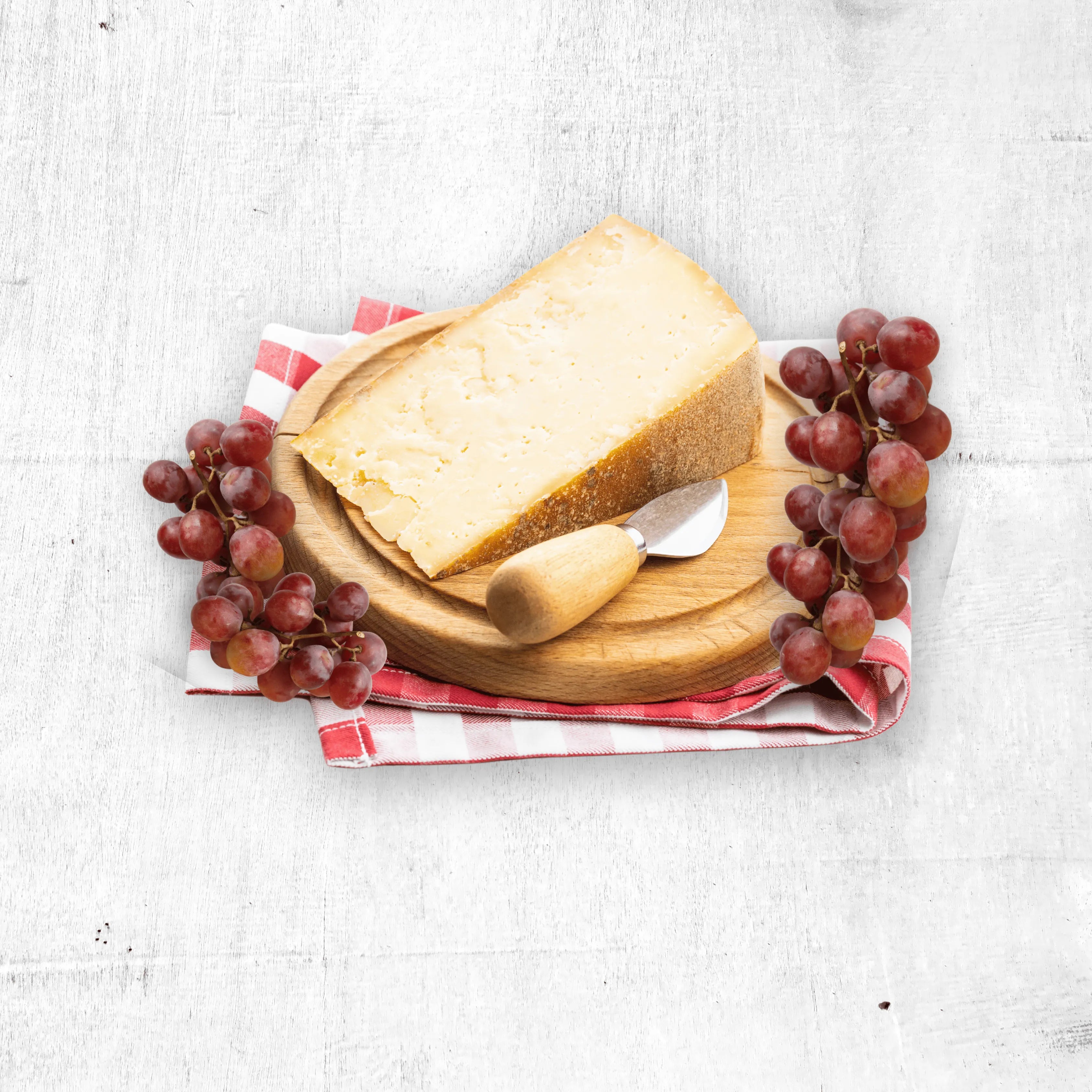 Aged Cheese with Grapes and Cheese Knife